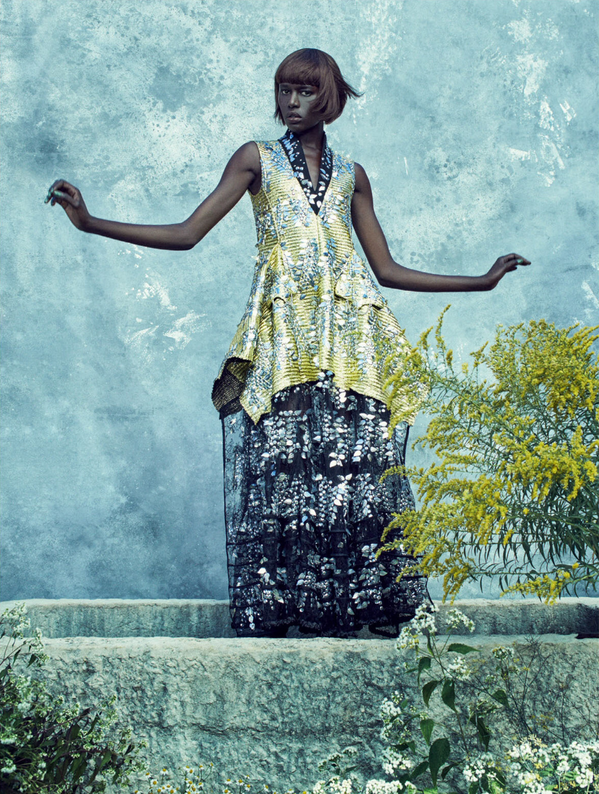 Ajak Deng Poses In A Blooming Paradise for ELLE UK
