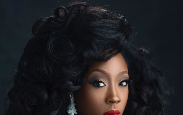Beverly Naya Understands the Beauty of A Bold Red Pout