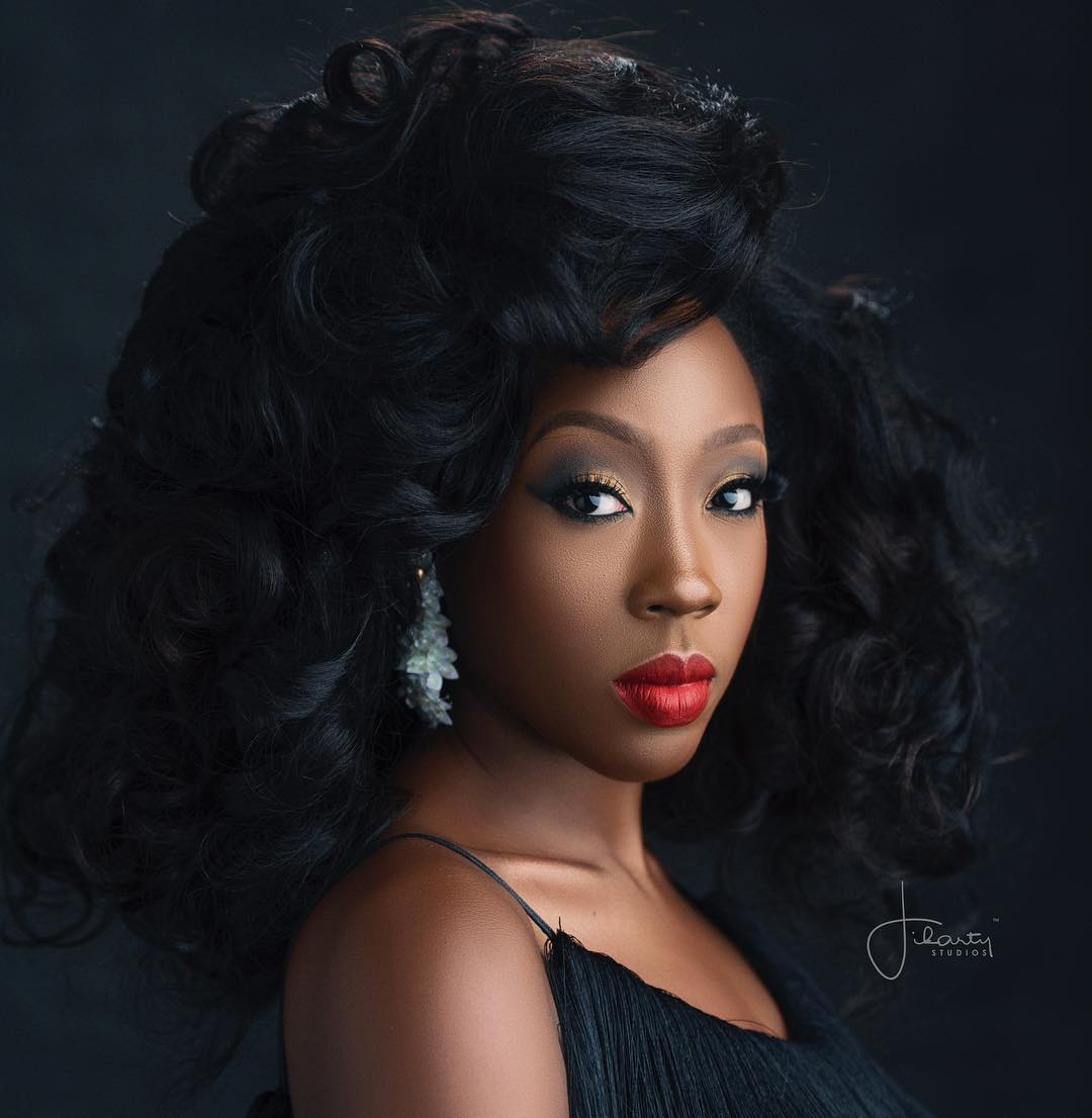 Beverly Naya Understands the Beauty of A Bold Red Pout