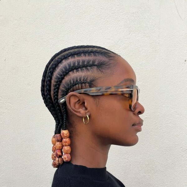 Short stitch straight all-back cornrow hairstyle with beads