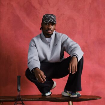 Mike Afolarin in a grey Adidas sweatshirt