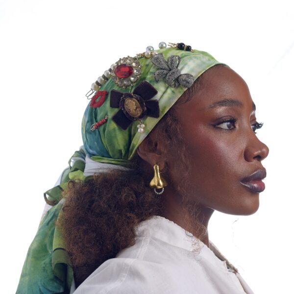 Green headscarf with broaches and hair clips