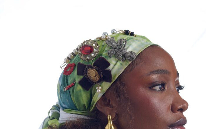 Green headscarf with broaches and hair clips