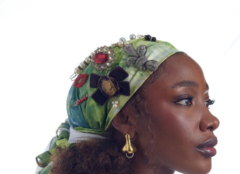 Green headscarf with broaches and hair clips
